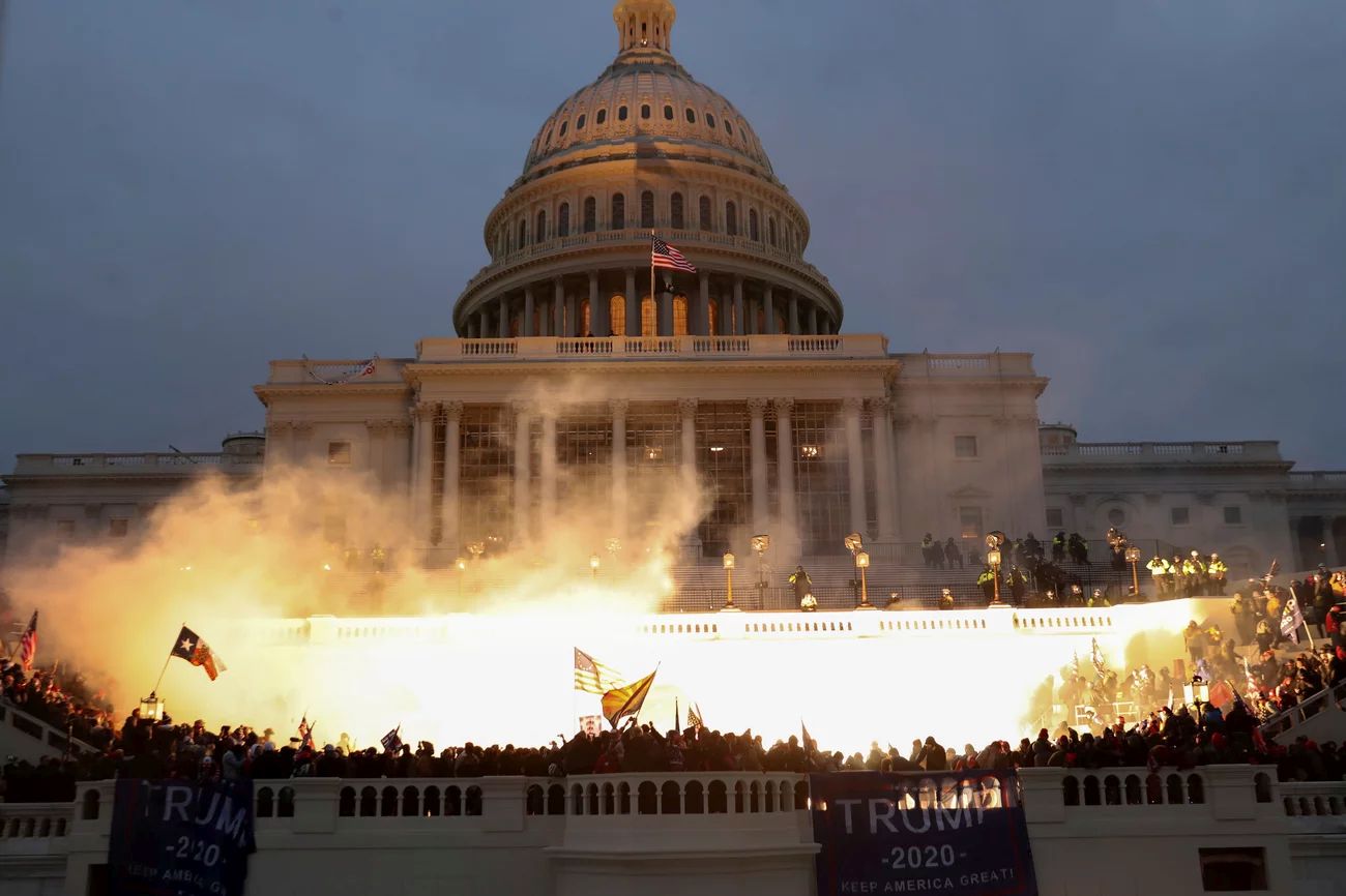 US Capitol Builing January 6, 2020: Flash bangs as insurrectionist rioters assault the capitol.  Photo: Leah Millis-Reuters